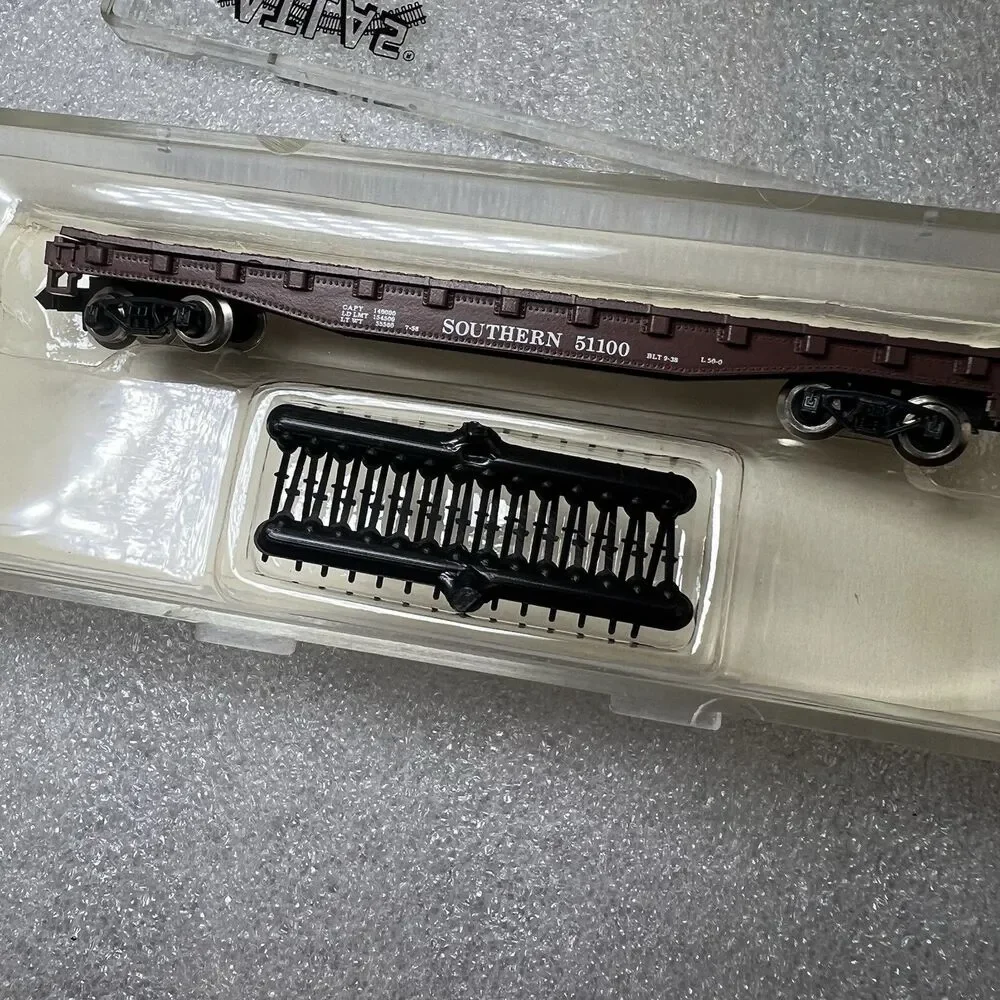 Atlas N Gauge Flat Car with Stakes Southern 3811 Brown Plastic NEW